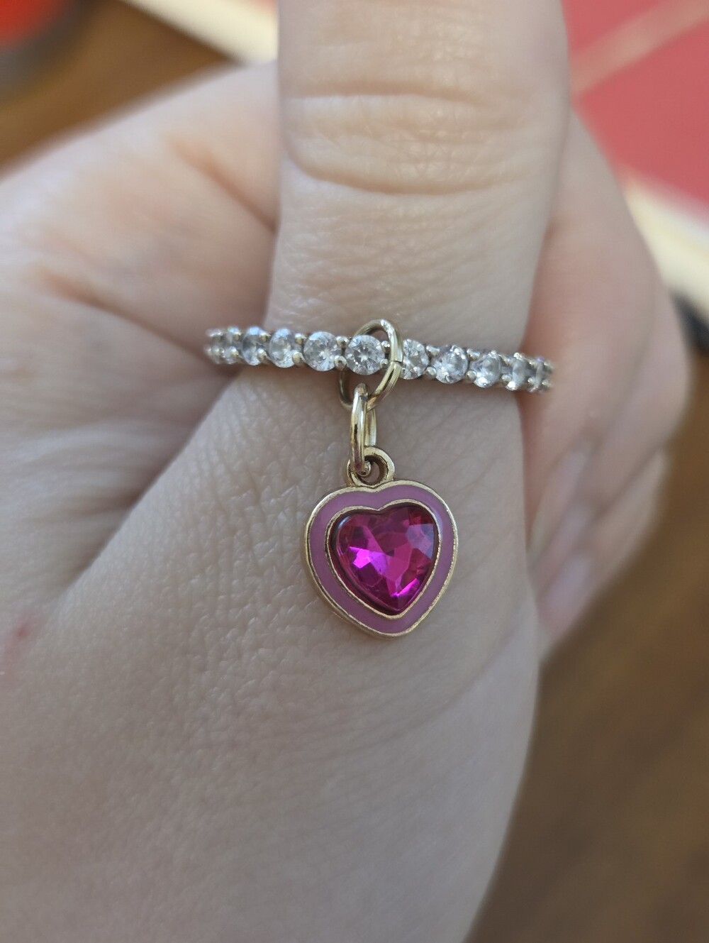 Gold-Tone Ring with Pink Heart Charm